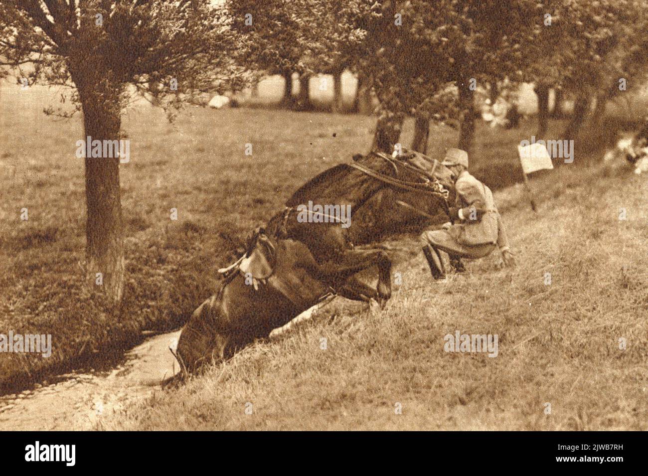Sur le programme V.V. A également été mentionné un pays dans la région de Rijnauwen. Cette grande agilité était nécessaire pour cela, ce qui montre clairement ce tableau, si seulement pour empêcher les gens d'obtenir une combinaison humide. Banque D'Images