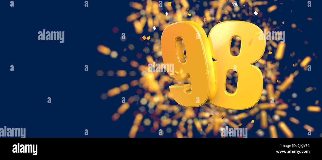 Numéro d'or 98 au premier plan avec des confettis d'or tombant et des feux d'artifice hors de la mise au point sur un fond bleu foncé. 3D Illustration Banque D'Images