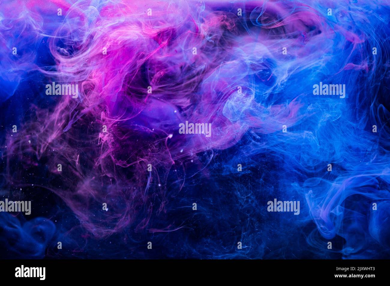 couleur fumée fond créatif peinture bleu rose Banque D'Images