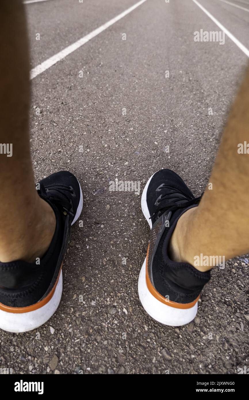 Détail d'un jeune homme qui fait du sport en plein air Banque D'Images