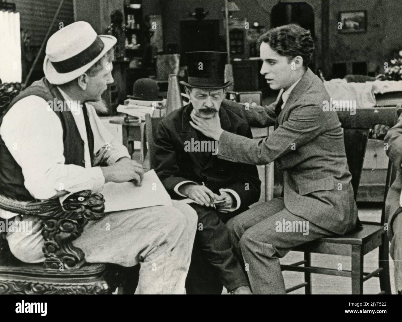 Acteurs Tom Wilson, Loyal Underwood et Charlie Chaplin dans le film The Professor, USA 1919 Banque D'Images
