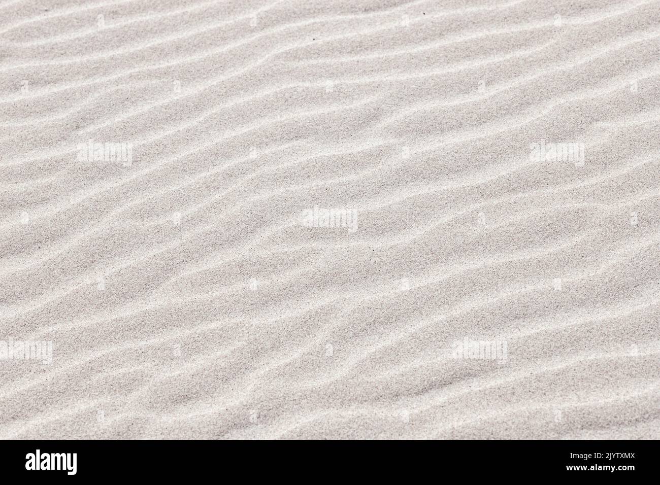 surface de sable en forme d'onde, motif naturel, surface de sable, arrière-plan abstrait Banque D'Images