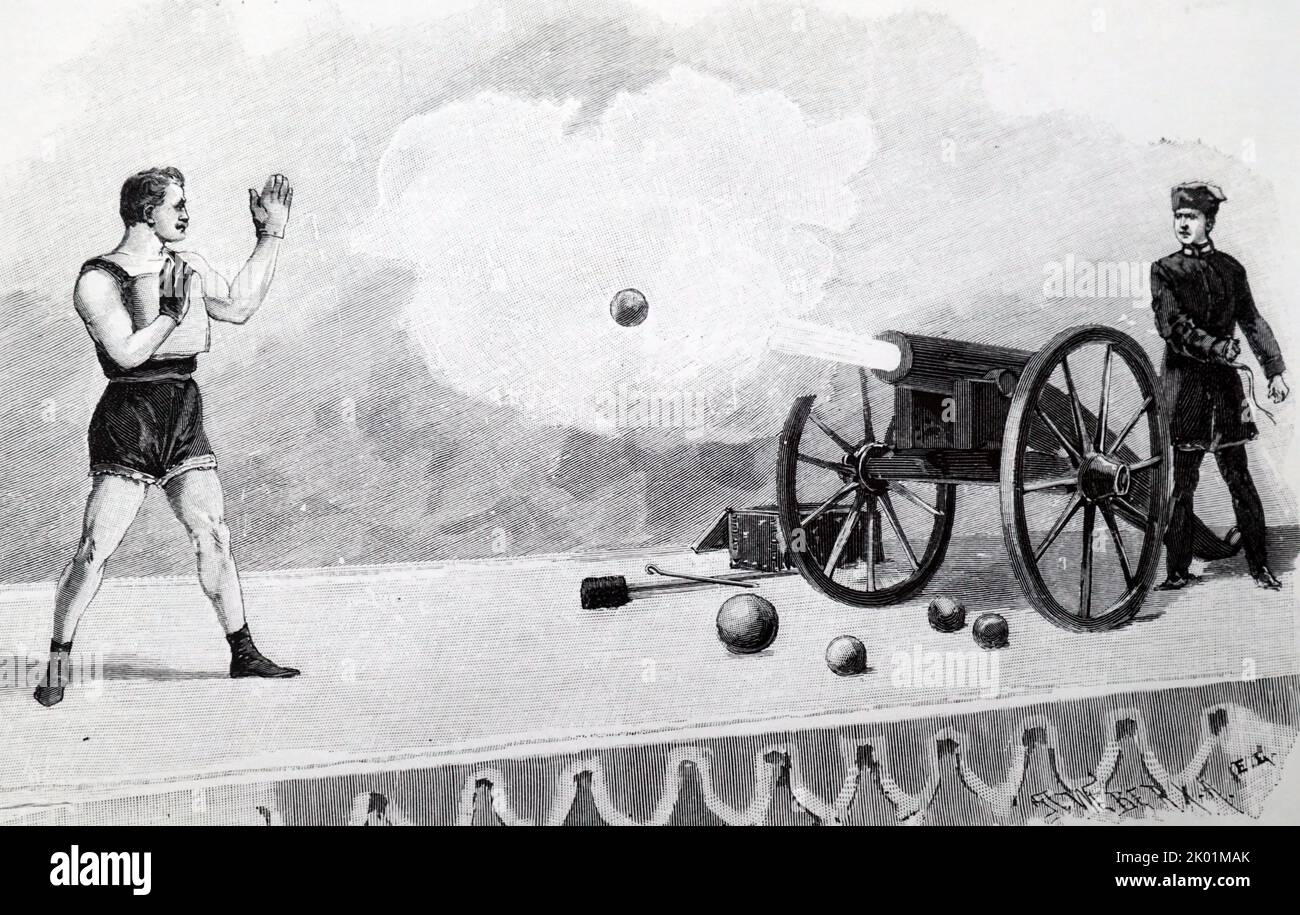 John Holtum arrêtant un ballon de canon en vol. Banque D'Images