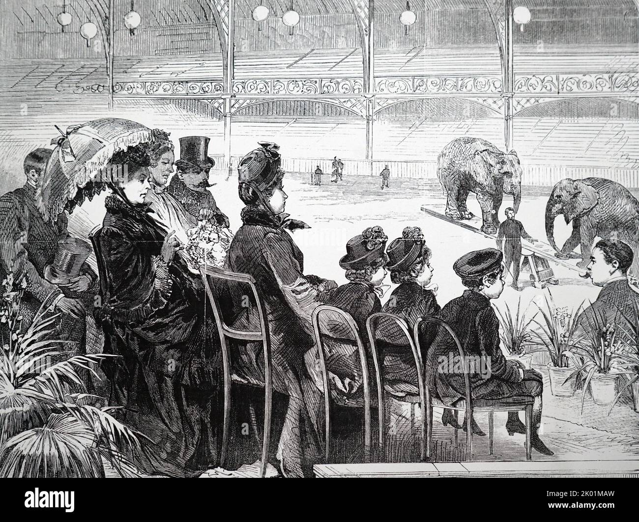 La reine Victoria emmène trois de ses petits-enfants à un spectacle privé au cirque d'Olympia. Banque D'Images