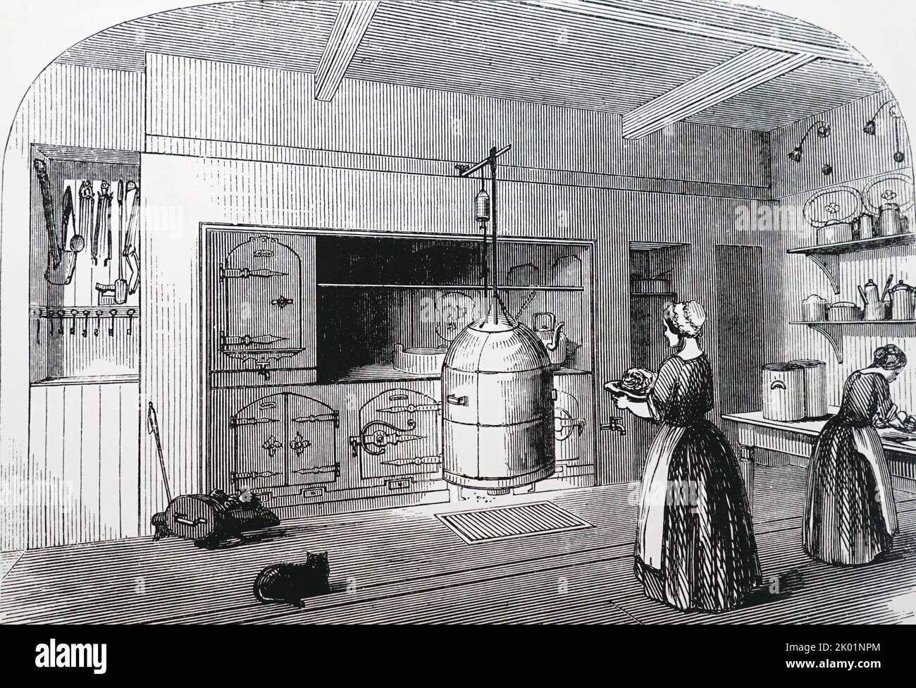 Scène de cuisine montrant la gamme fabriquée par Henry Goddard de Nottingham. Banque D'Images