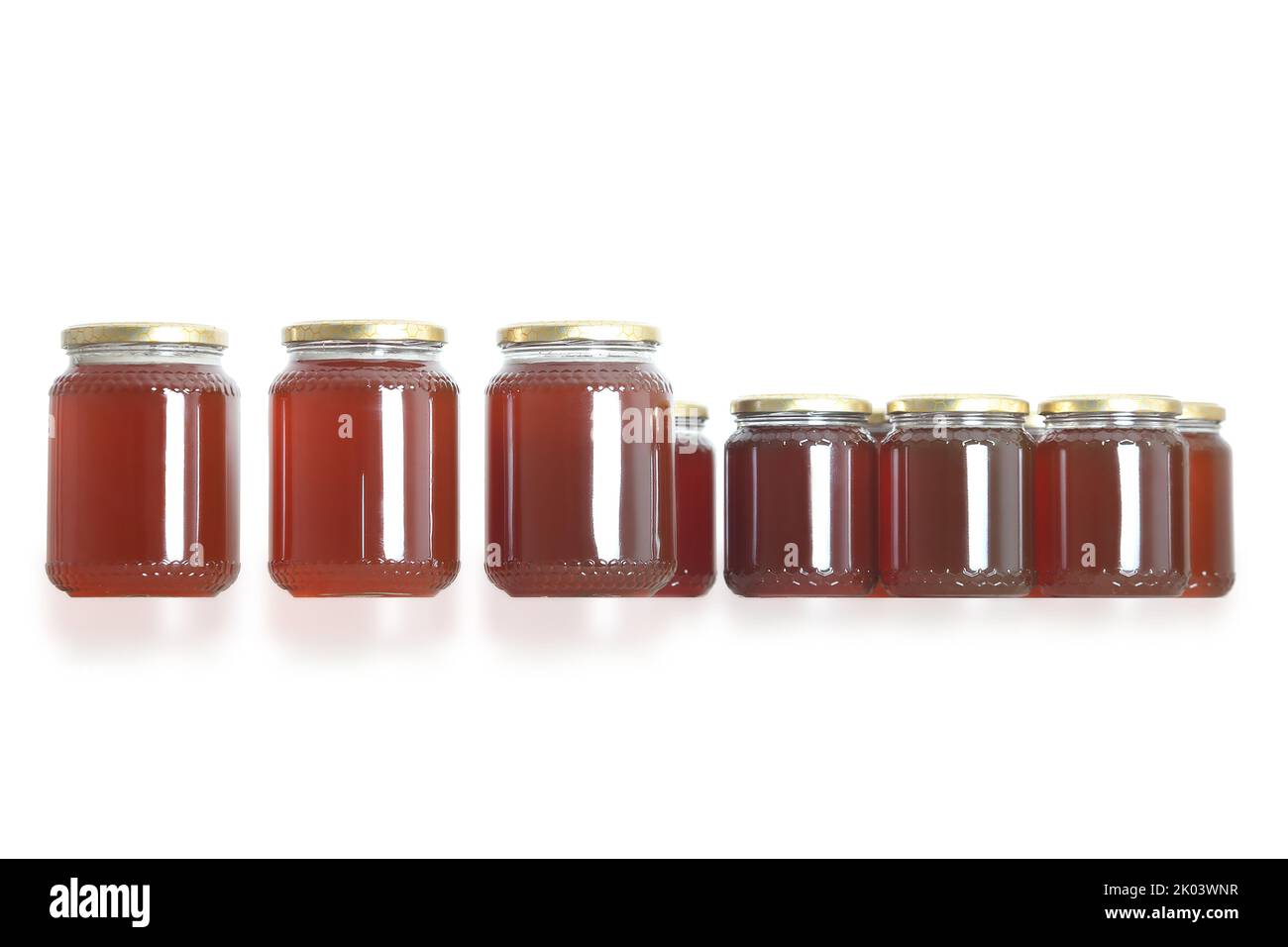 apiculture - pots de miel sur fond blanc Banque D'Images