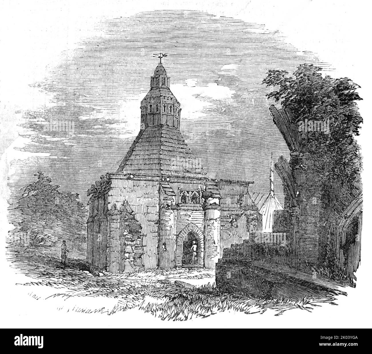 La cuisine de l'Abbé, Glastonbury, 1854. Une partie des ruines de l'abbaye de Glastonbury dans le Somerset : '... le jardin de l'abbé, un bâtiment octogonal de dimensions ancestrales, a soulevé sa forme pyramidale, et avec son dôme voûté et sa vieille lanthorne pittoresque, se rappelait les histoires des « moines de l'ancien », quand des abbés élégants et des frères portristes passèrent des heures joviales dans le réfectoire, discutant du capon et de la pâteuse, et drainant les drapeaux du vin avec le gousto épicurien. De "Illustrated London News", 1854. Banque D'Images