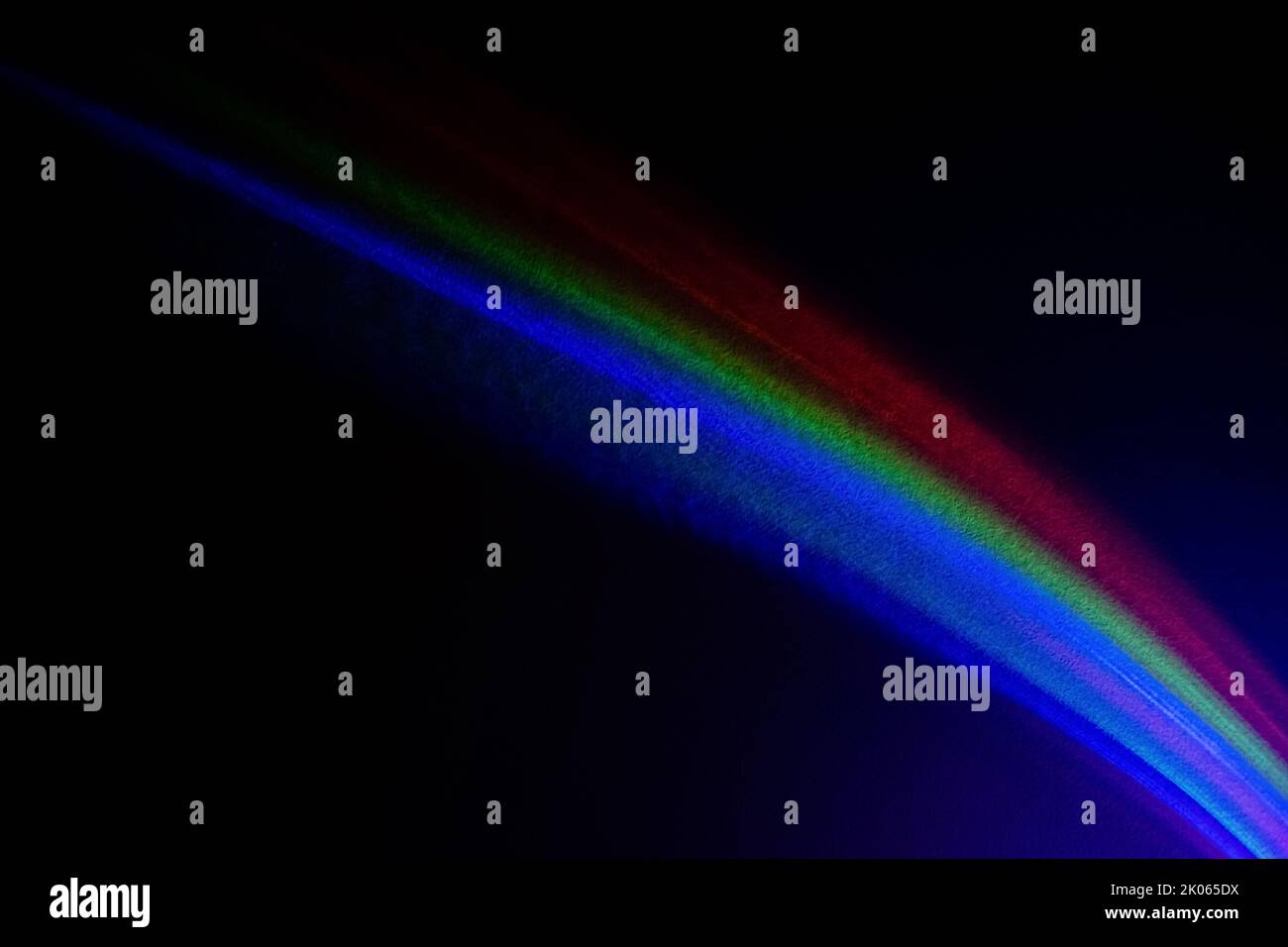 arrière-plan arc-en-ciel flou néon clair coloré foncé Banque D'Images