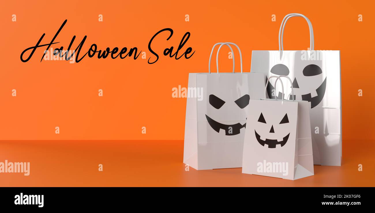 Texte de promotion de la vente d'Halloween, sacs en papier souriants blanc brillant sur fond orange, espace de copie. Carte d'achat saisonnière, bannière Web, affaires Banque D'Images