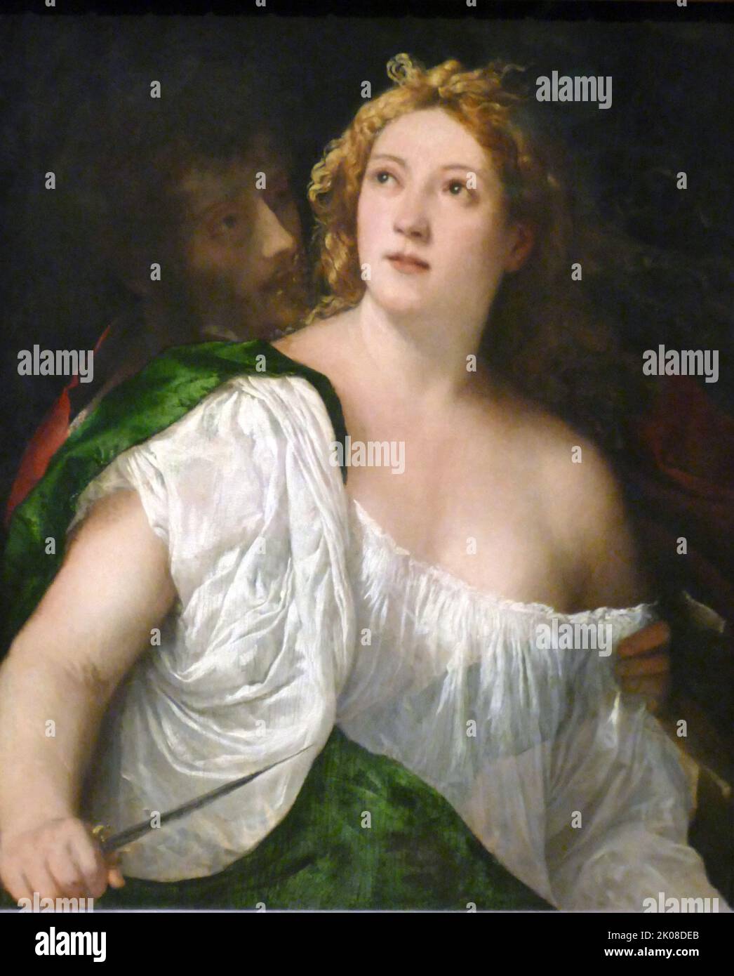 Lucrecia et son mari, c1515 par Tiziano Vecelli ou Vecellio (c. 1488/90 - 27 août 1576), connu en anglais sous le nom de Tizian, un peintre italien (vénitien) pendant la Renaissance Banque D'Images
