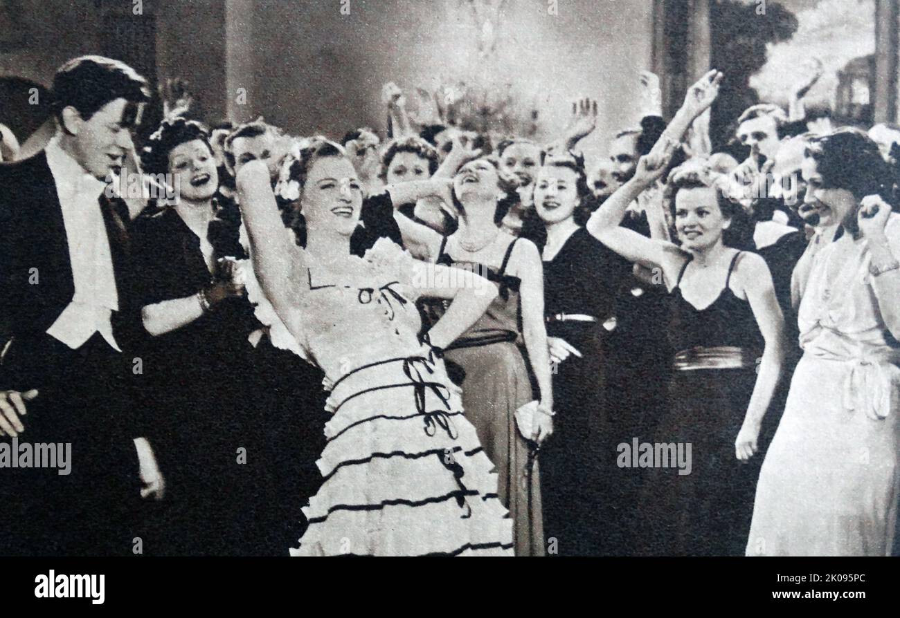 Gracie Fields in Shipyard Sally est un film de comédie musicale britannique de 1939. Dame Gracie Fields DBE OStJ (née Grace Stansfield; 9 janvier 1898 - 27 septembre 1979) était une actrice anglaise, chanteuse, comédienne et star du cinéma et de la salle de musique, qui a été l'une des dix meilleures stars de cinéma en Grande-Bretagne pendant les 1930s et la plus haute star de cinéma payée dans le monde en 1937. Banque D'Images