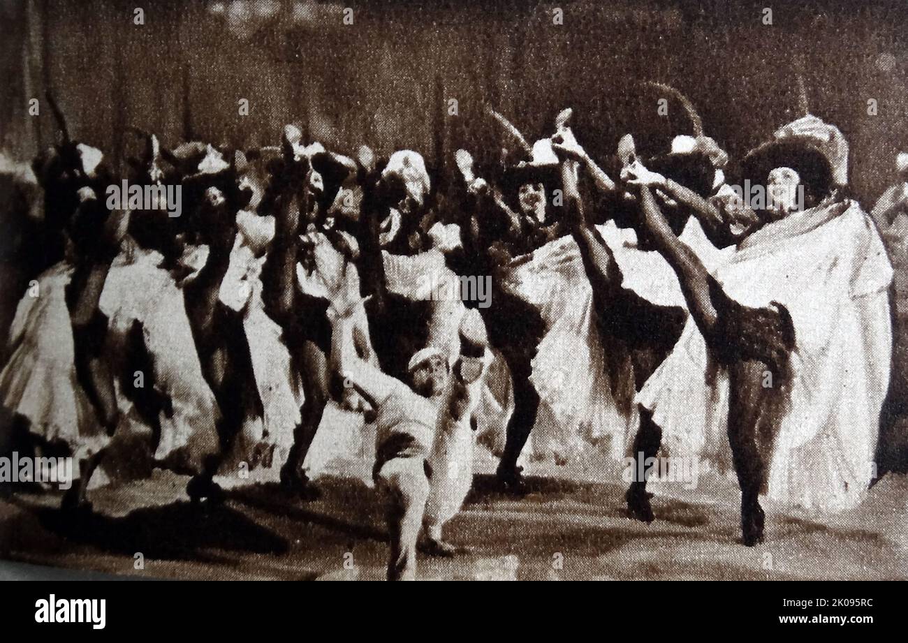 Gene Kelly dans un américain à Paris, un film de comédie musicale américain de 1951 inspiré par la composition orchestrale de 1928 un américain à Paris par George Gershwin. Eugene Curran Kelly (23 août 1912 - 2 février 1996) était un acteur, danseur, chanteur, cinéaste et chorégraphe américain. Il était connu pour son style de danse énergique et athlétique, ses bons looks et les personnages qu'il a joués à l'écran. Banque D'Images