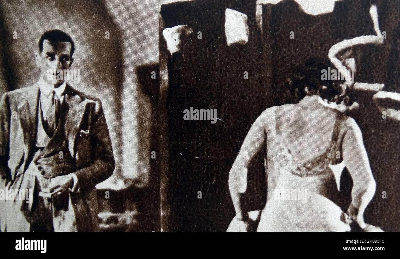 John Longden et Anny Ondra dans le chantage, un film dramatique de thriller britannique de 1929 réalisé par Alfred Hitchcock. John Longden (11 novembre 1900 - 26 mai 1971) est un acteur de cinéma anglais né en Inde de l'Ouest. Anny Ondra (née Anna Sophie Ondrakova ; 15 mai 1903 - 28 février 1987) est une actrice tchèque. Elle a débuté sa carrière en 1920 et est apparue dans des films tchèques, allemands, autrichiens, français et anglais. En 1933, elle épouse le champion de boxe allemand Max Schmeling. Banque D'Images