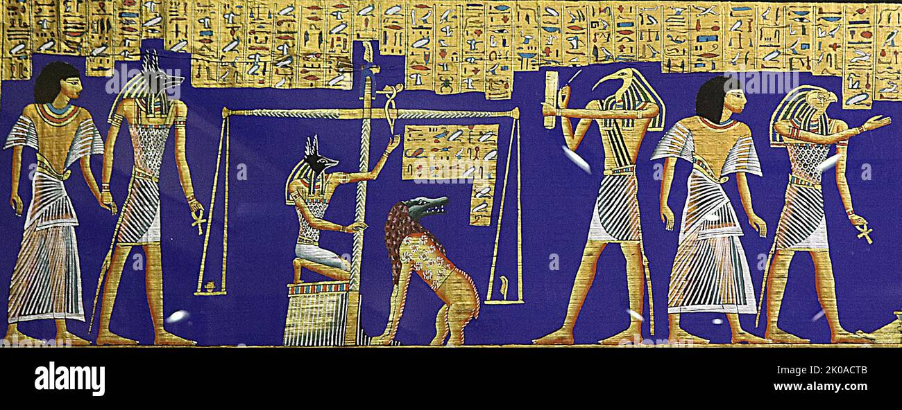 Papyrus égyptien moderne illustrant la pesée des âmes pour décider du sort d'une personne déssoulagée Banque D'Images