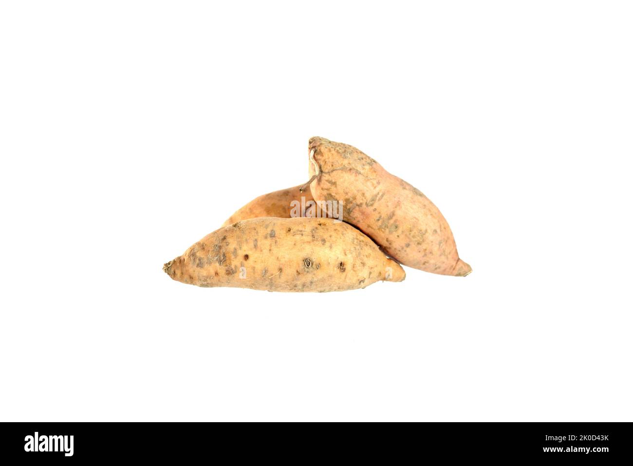 patates douces jaunes sur fond blanc Banque D'Images