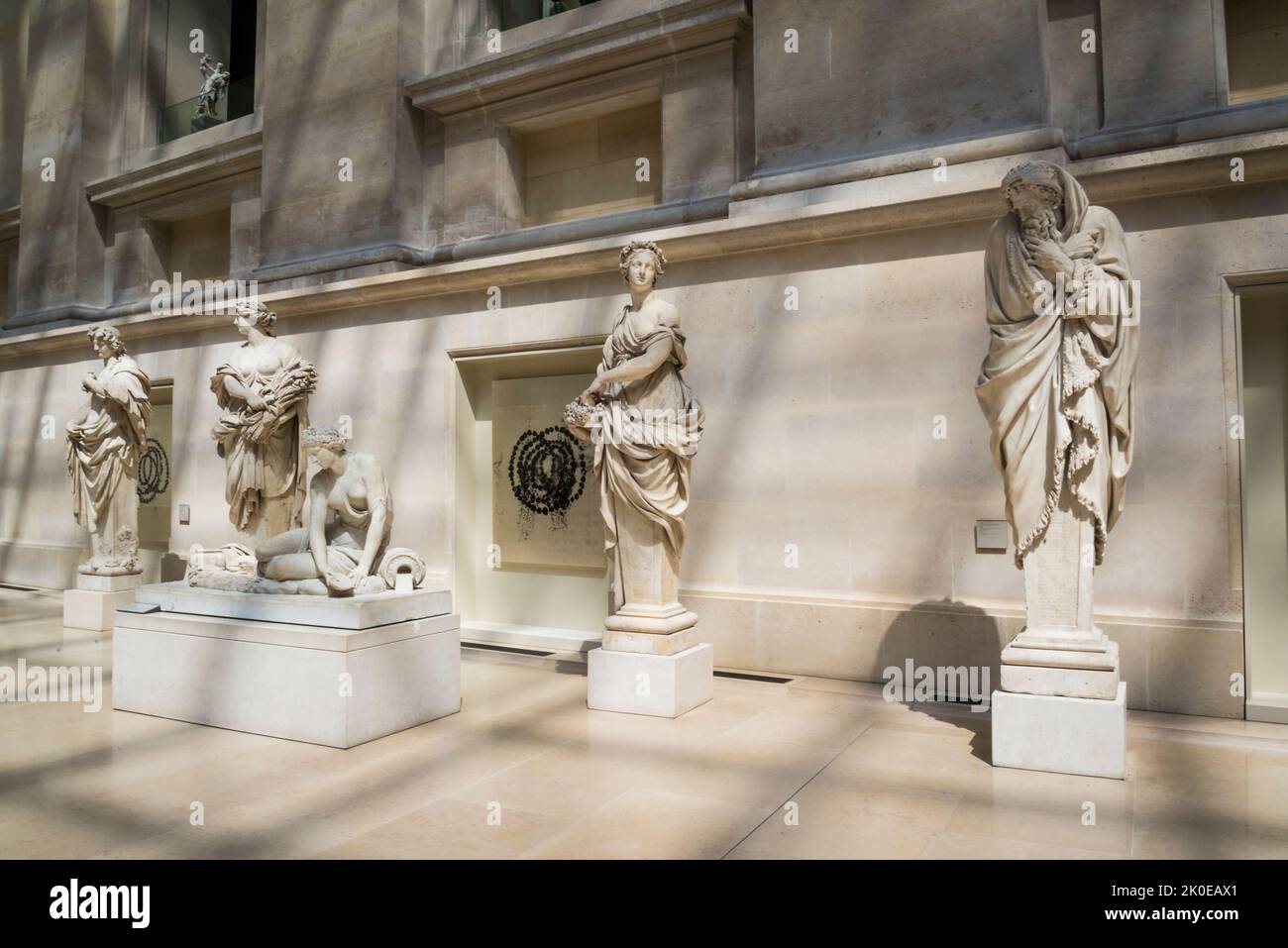 Laviron: Sculptures 'four Seasons', , le Cour Puget où la sculpture française est exposée, Musée du Louvre, le musée le plus visité au monde, Paris France Banque D'Images