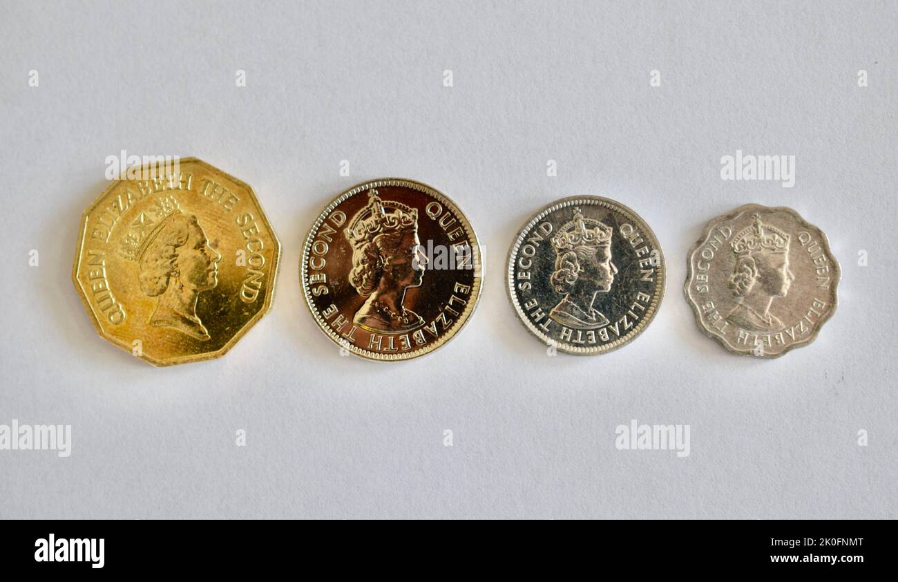 1 $, 0,25 $, 0,05 $ et $0,01 pièces en monnaie bélizéenne avec le portrait de l'image de la reine Elizabeth II. Banque D'Images