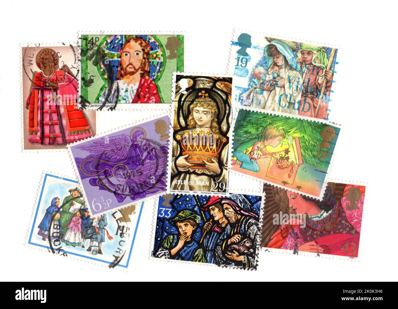 Un montage de timbres-poste de Noël de Grande-Bretagne sur fond blanc. Banque D'Images