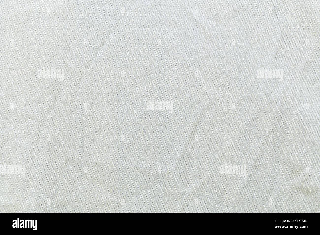 Directement au-dessus de la texture du tissu gris comme arrière-plan. Banque D'Images