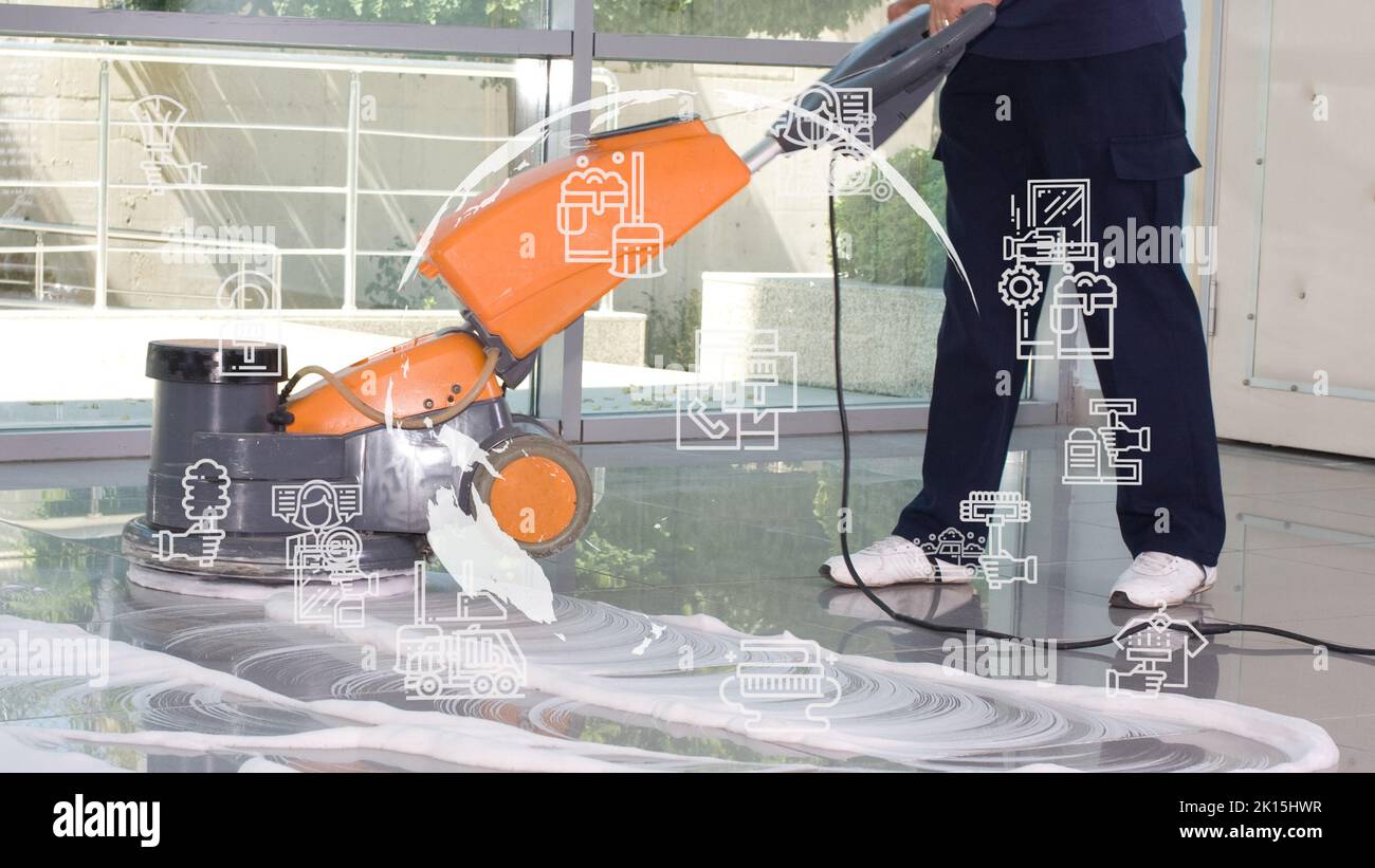 lavage professionnel des sols en machine, nettoyage à l'eau dans l'entreprise. Banque D'Images