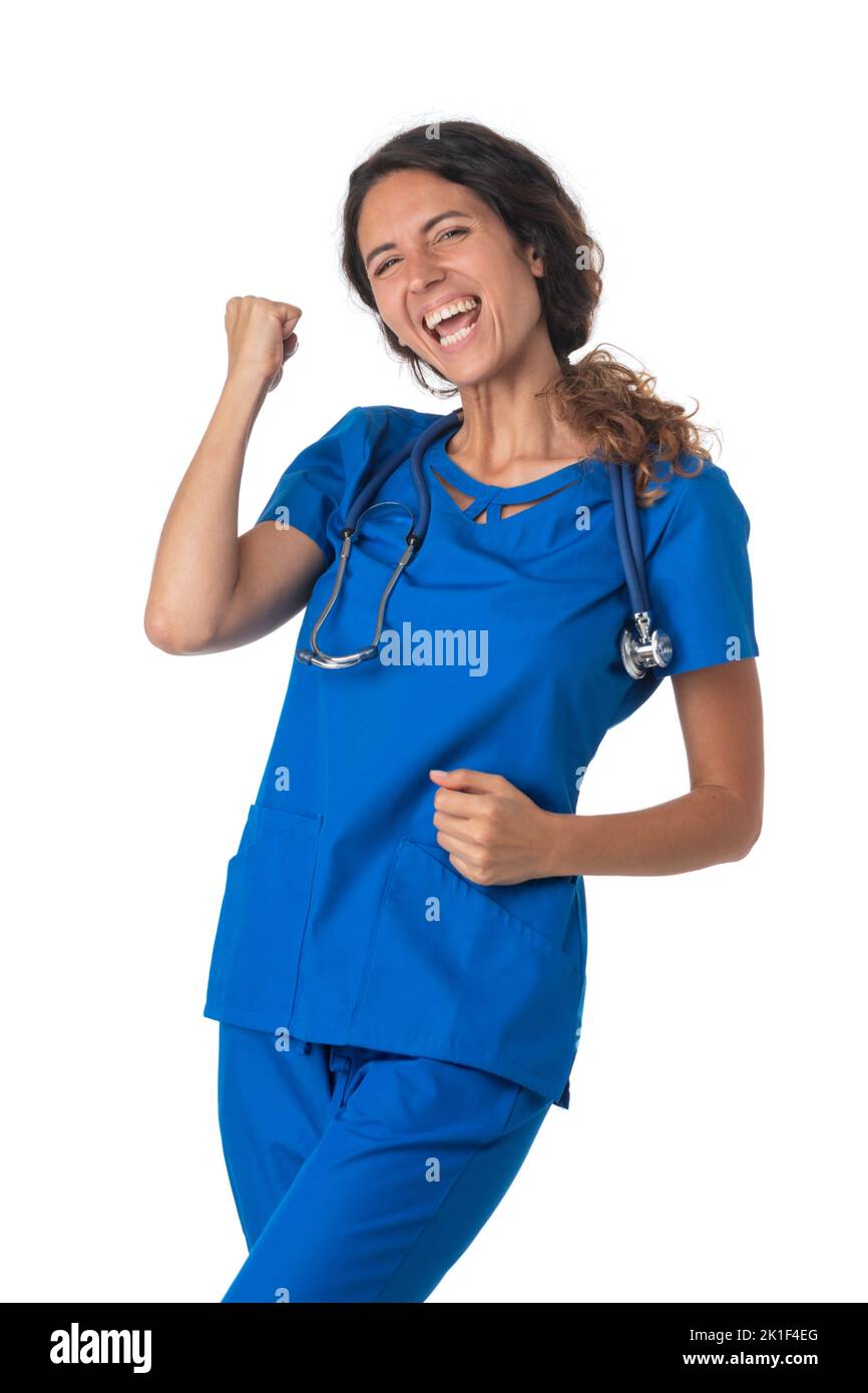 Jeune infirmière médicale professionnelle de soins de santé tenant des poings isolés sur fond blanc portrait de studio Banque D'Images