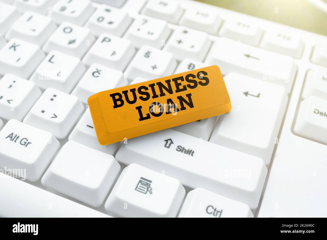 Légende conceptuelle Business Loan. Mot pour crédit hypothécaire aide financière avances de fonds dette de création de nouveau jeu de typage concept, Abstract dactylographiing problème Solutions Banque D'Images