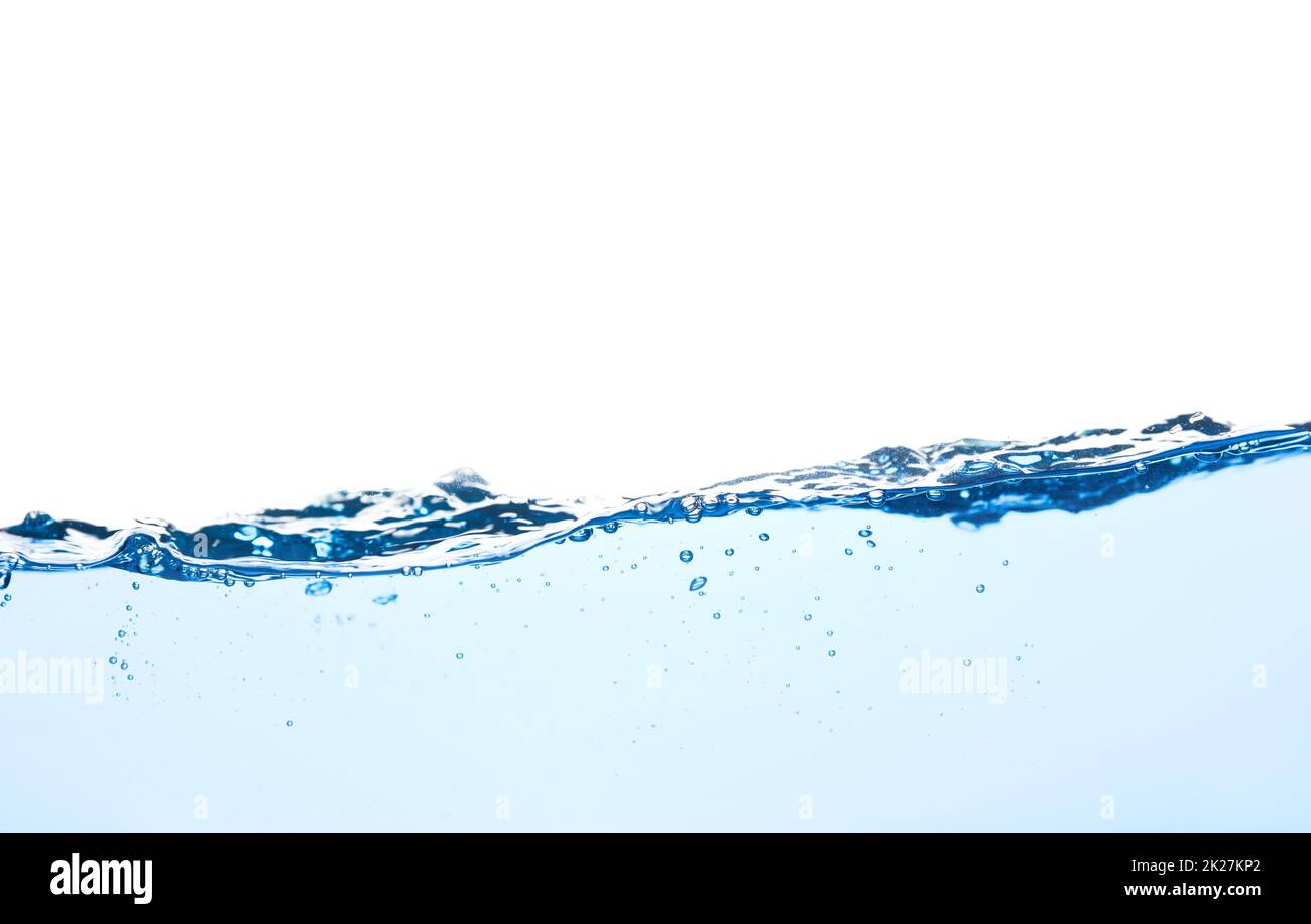 Vague d'eau bleu clair avec bulles d'air et un peu un embout éclaboussé sous l'eau Banque D'Images