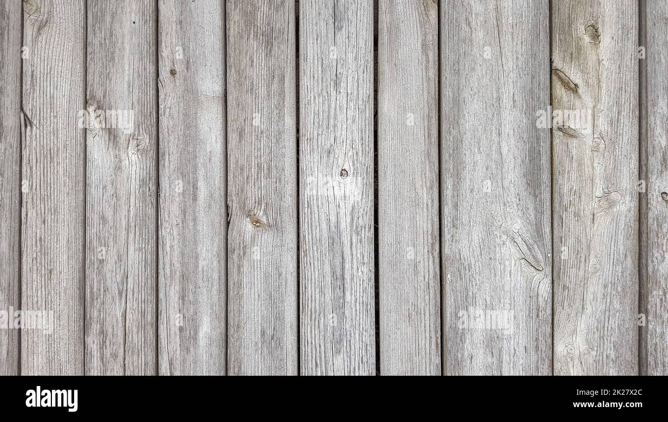 Fond de texture bois de planche de grunge.Gros plan sur les panneaux de clôture en bois gris Banque D'Images