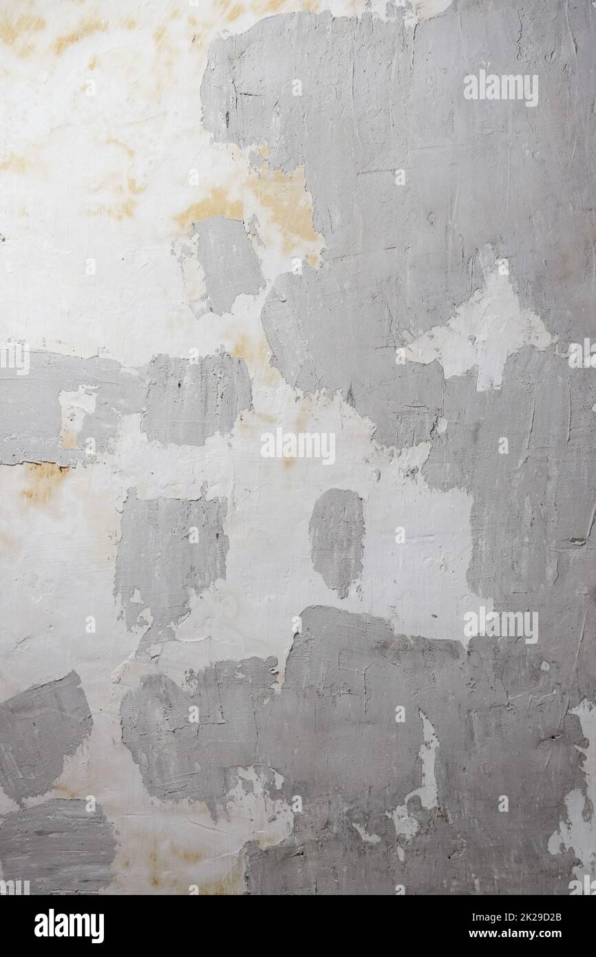 Texture d'arrière-plan, mur pendant la rénovation, peinture à la pâte et blanchissage à la chaux. Banque D'Images
