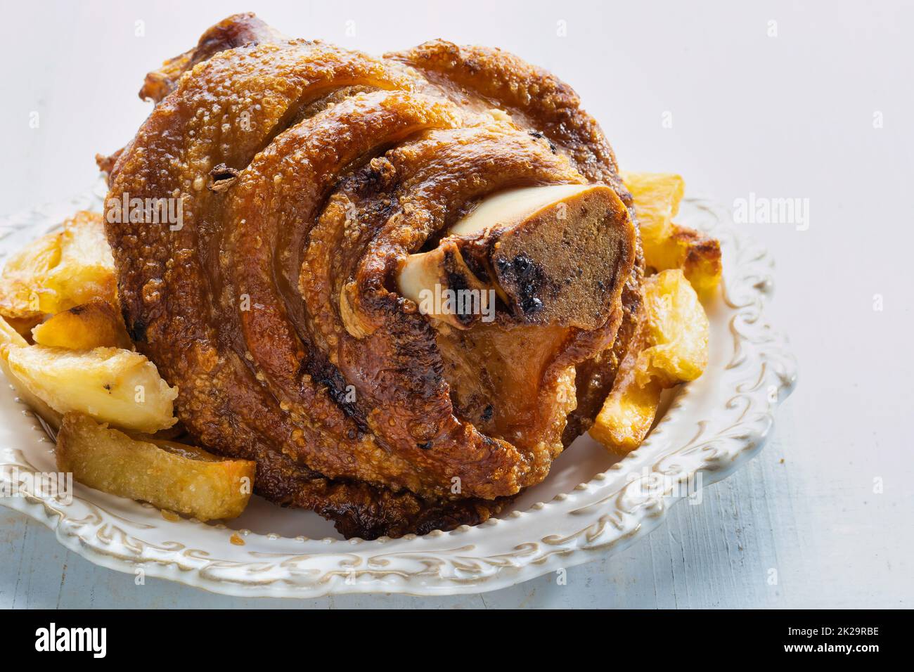 porte-jarret de porc allemand rustique doré Banque D'Images