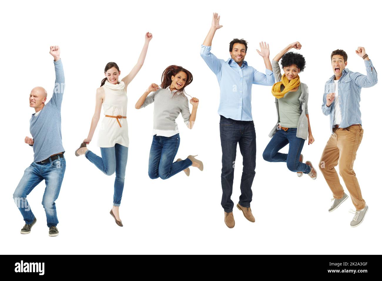 Célébrations isolées. Photo d'un groupe de personnes excitées qui sautent dans les airs. Banque D'Images