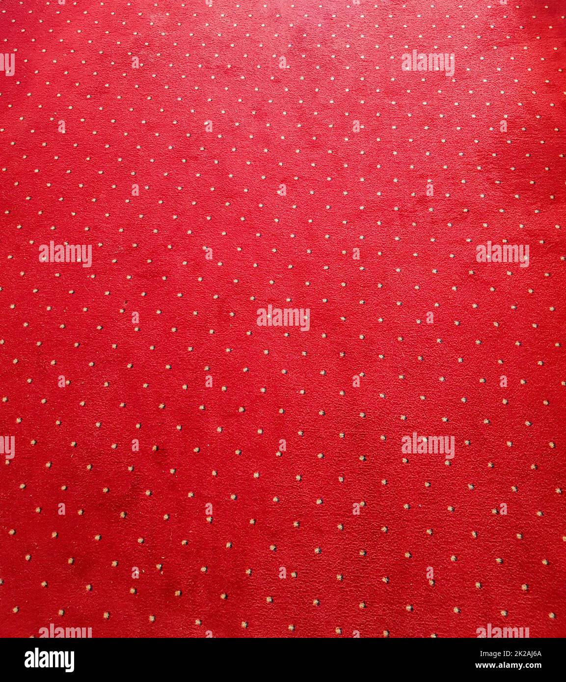 Gros plan de la texture du tapis rouge sur le sol, arrière-plan Banque D'Images
