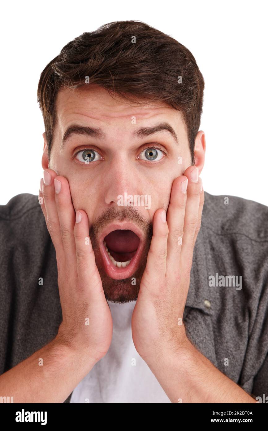 Je n'y crois pas. Gros plan portrait en studio d'un jeune homme qui se — free download
