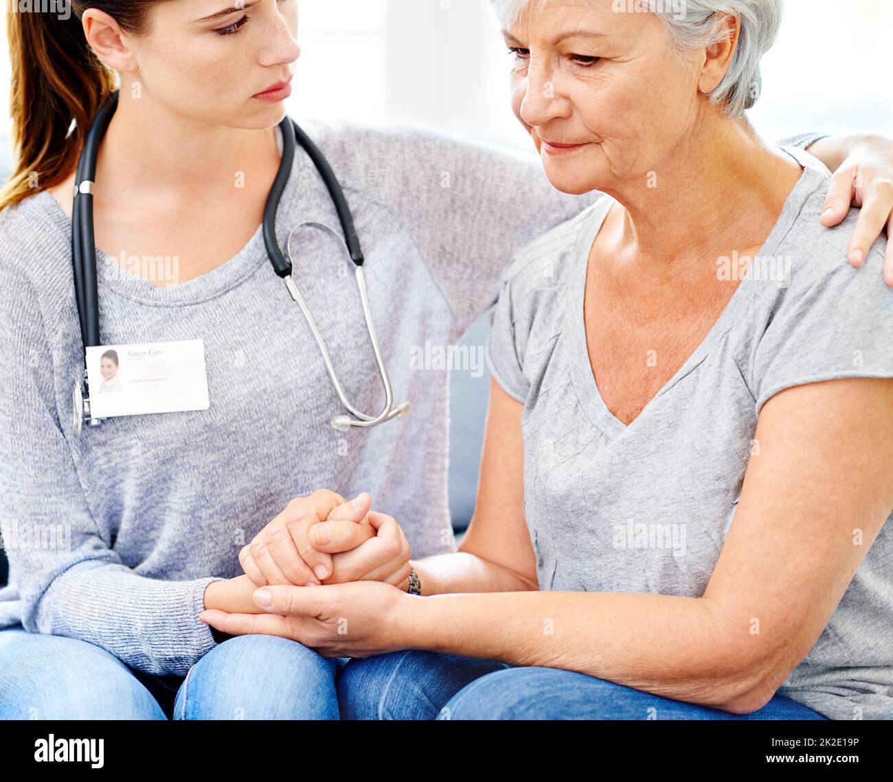 Facing the worst. A doctor comforting a senior patient after some bad news. Banque D'Images