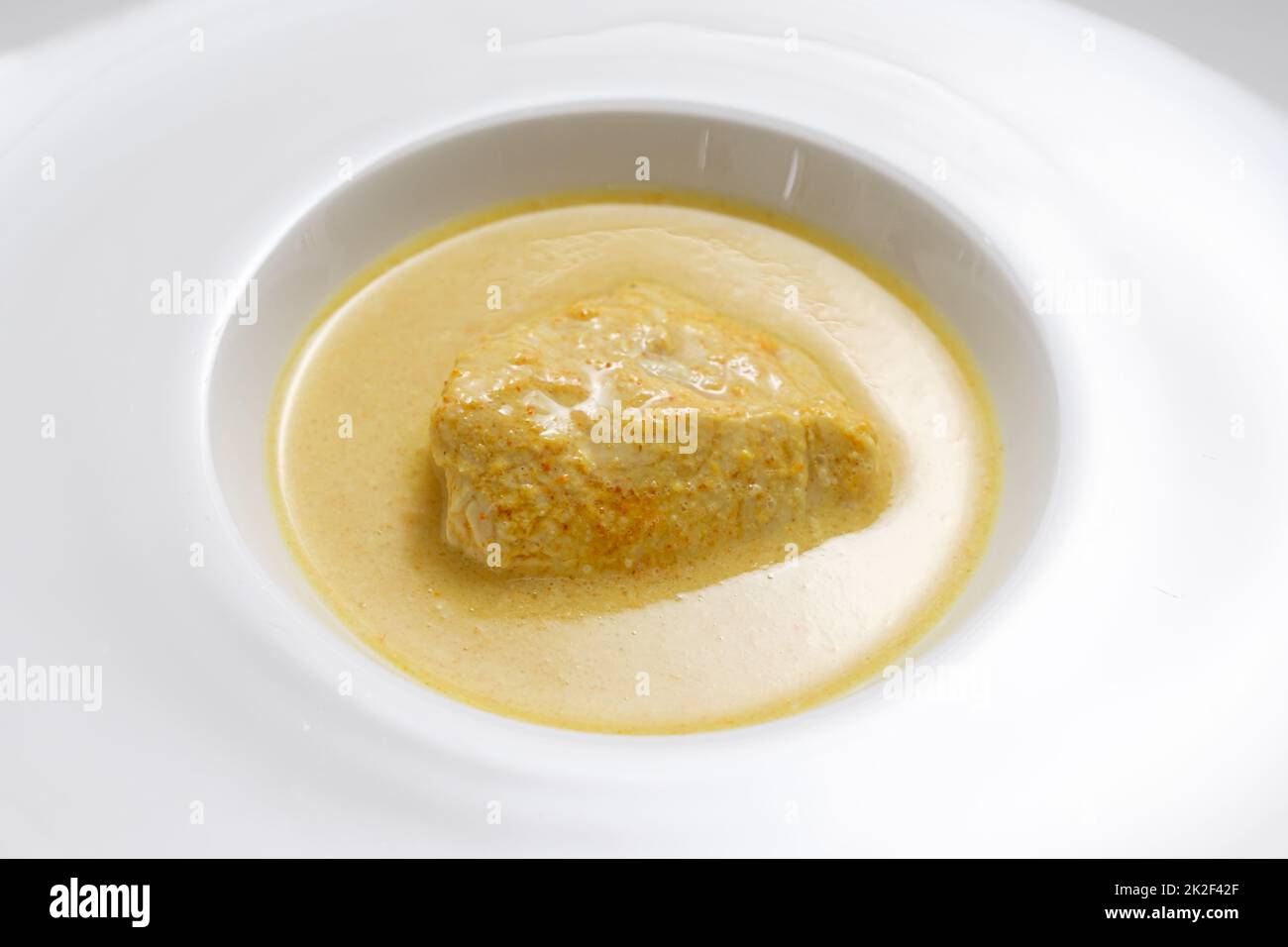 Curry de poulet épicé au lait de coco Banque D'Images