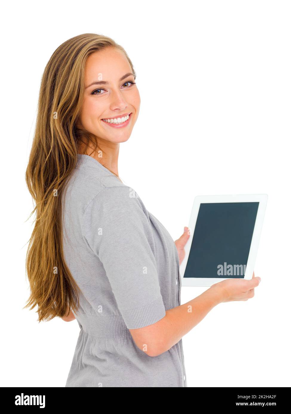 Mon pratique pnline explorer. Portrait en studio d'une jeune femme attrayante tenant une tablette numérique. Banque D'Images