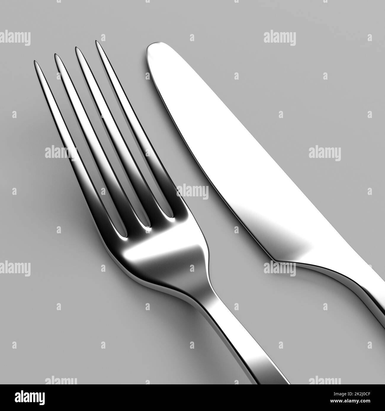Fourchette et couteau sur gray Banque D'Images
