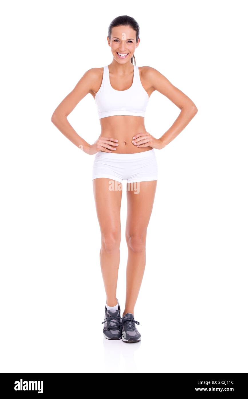 Affiche fille pour un corps sain.Portrait en studio d'une jeune femme en forme d'exercice isolée sur blanc. Banque D'Images