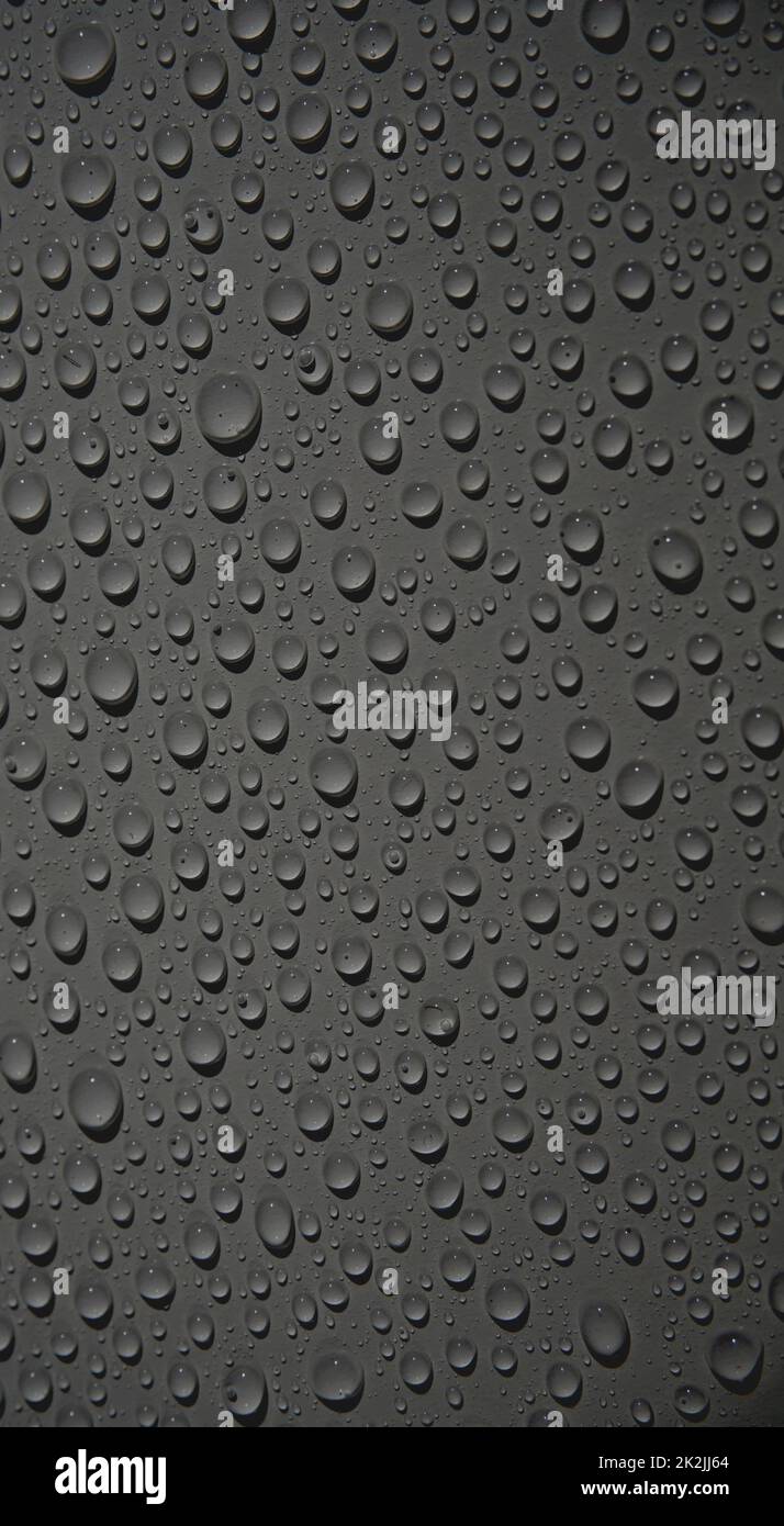 Texture d'arrière-plan sombre avec gouttes d'eau Banque D'Images