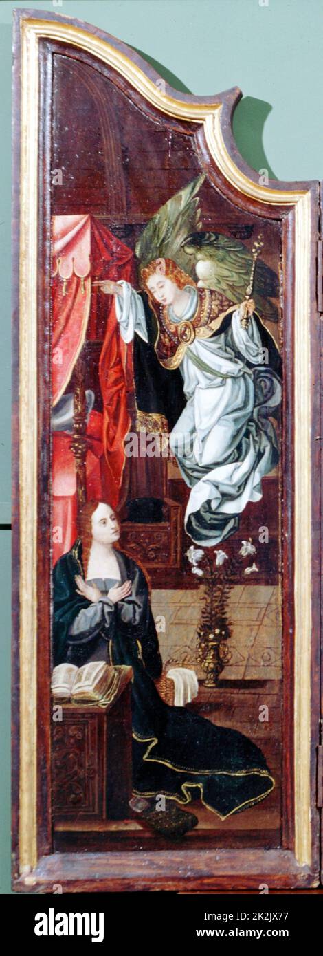 Adoration du triptyque des bergers attribuée à l'artiste flamand Cornelis Englebrechtsen (Engelberts 1468-1533). Panneau de gauche montrant l'Annonciation; Angel Gabriel semble s'agenouiller Marie. Le Lily en vase est la fleur de la Vierge symbolisant la pureté. Huile sur bois. Banque D'Images