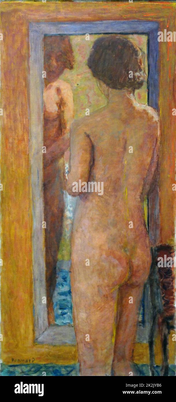 Femme à sa toilette de Pierre Bonnard (1867-1947). Huile sur toile, 1934. Bonnard est un peintre et graveur et membre fondateur de l'groupe de peintres postimpressionnistes les Nabis. Banque D'Images