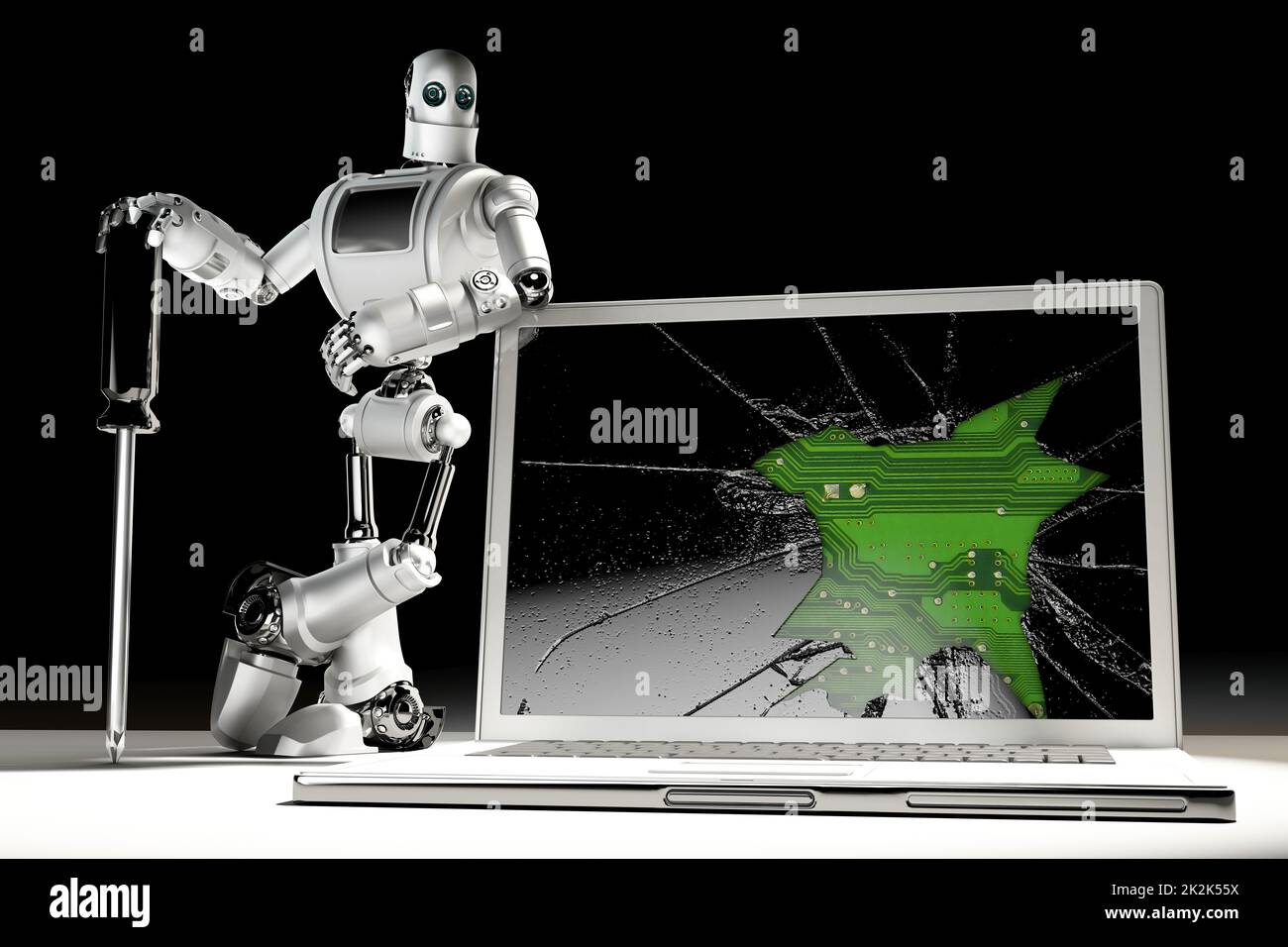 Technicien dont l'ordinateur portable est cassé. Concept de technologie. Contient un masque Banque D'Images