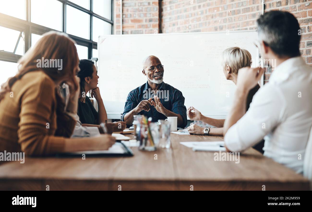 Travailler avec l'équipe pour arriver à une décision Banque D'Images