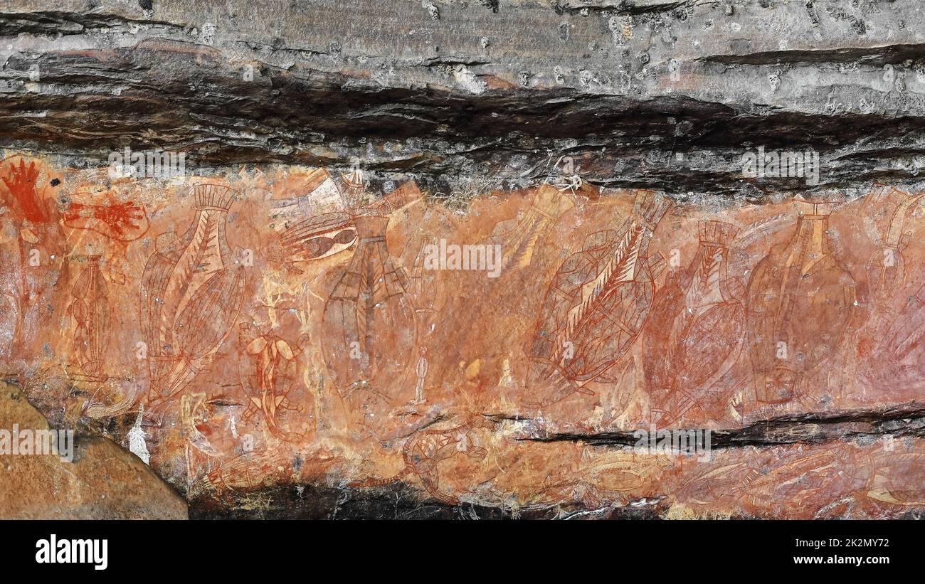 Art rupestre aborigène: Mains stencil-mullet, barramundi, poissons de chat-Goanna lézard-tortue à long cou. Ubirr-Kakadu-Australie-187 Banque D'Images