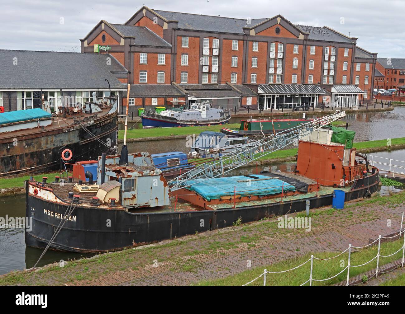 La barge MSC Pelican Manchester, 1956 ex-navire de Manchester bateau-grue canal, utilisé pour les magasins et l'appel d'offres bouy, a été retirée 1980 Banque D'Images