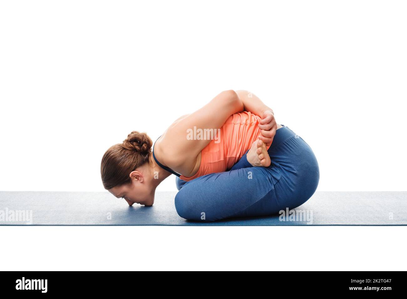 Femme mudrasana yoga asanas Banque D'Images