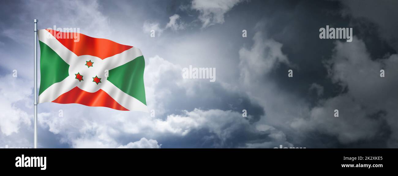 Drapeau burundais sur un ciel nuageux Banque D'Images