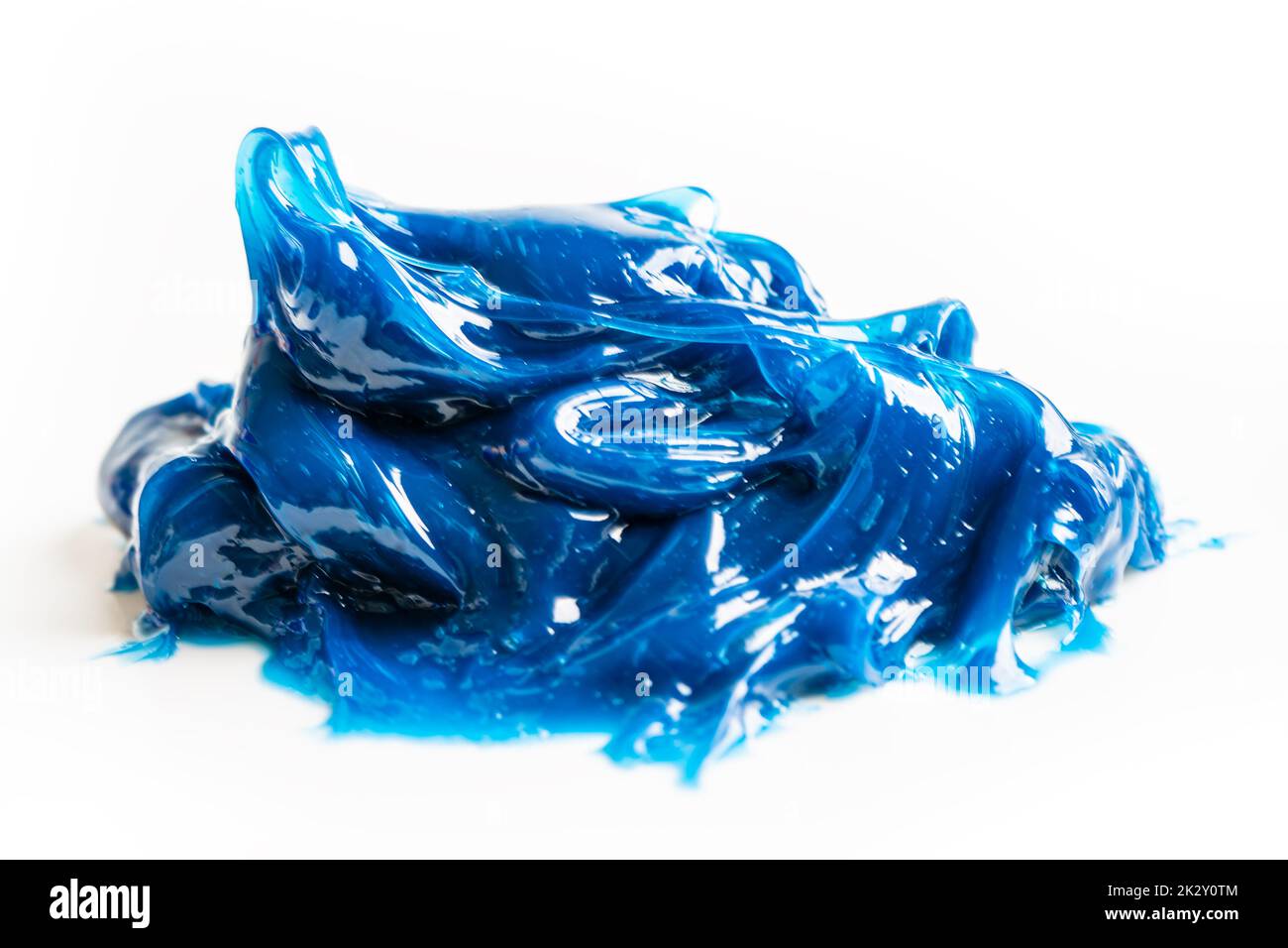 Graisse complexe au lithium synthétique de qualité supérieure bleue, températures élevées et lubrification des machines pour l'industrie automobile et industrielle. Banque D'Images