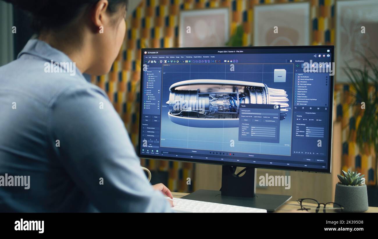 Femme 3D designer utilisant un pc avec un programme professionnel et créant 3D prototype de turbine d'avion tout en travaillant à distance au bureau à domicile Banque D'Images