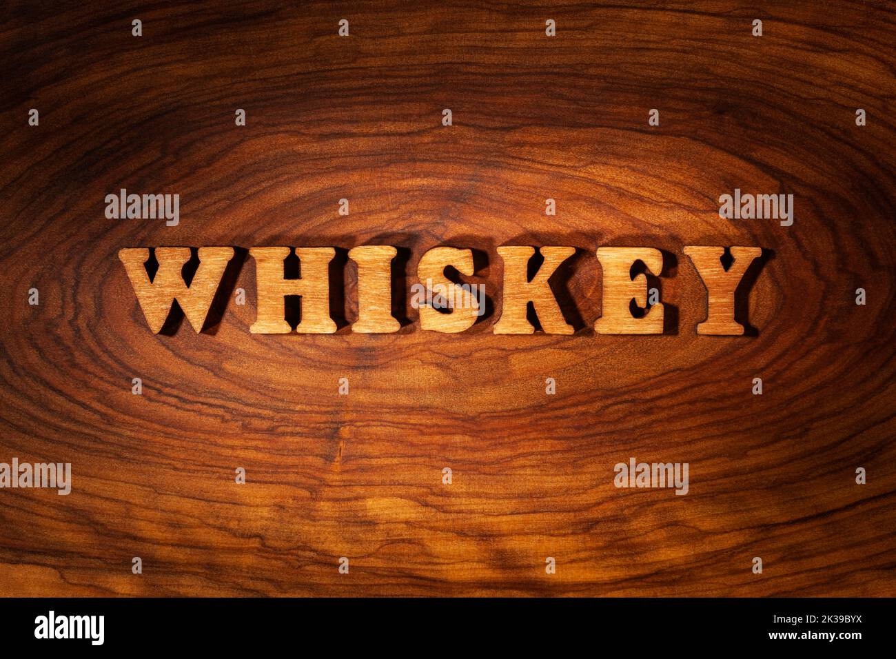 Whiskey word - Inscription by wooden letters close up Banque D'Images